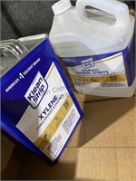 Open containers of Kylean strip mineral spirits,