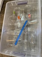 Tote with lid filled with plastic drinking