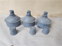 Three antique steel smudge pots