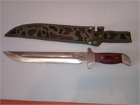 Case 440 stainless steel knife with camo sheath.