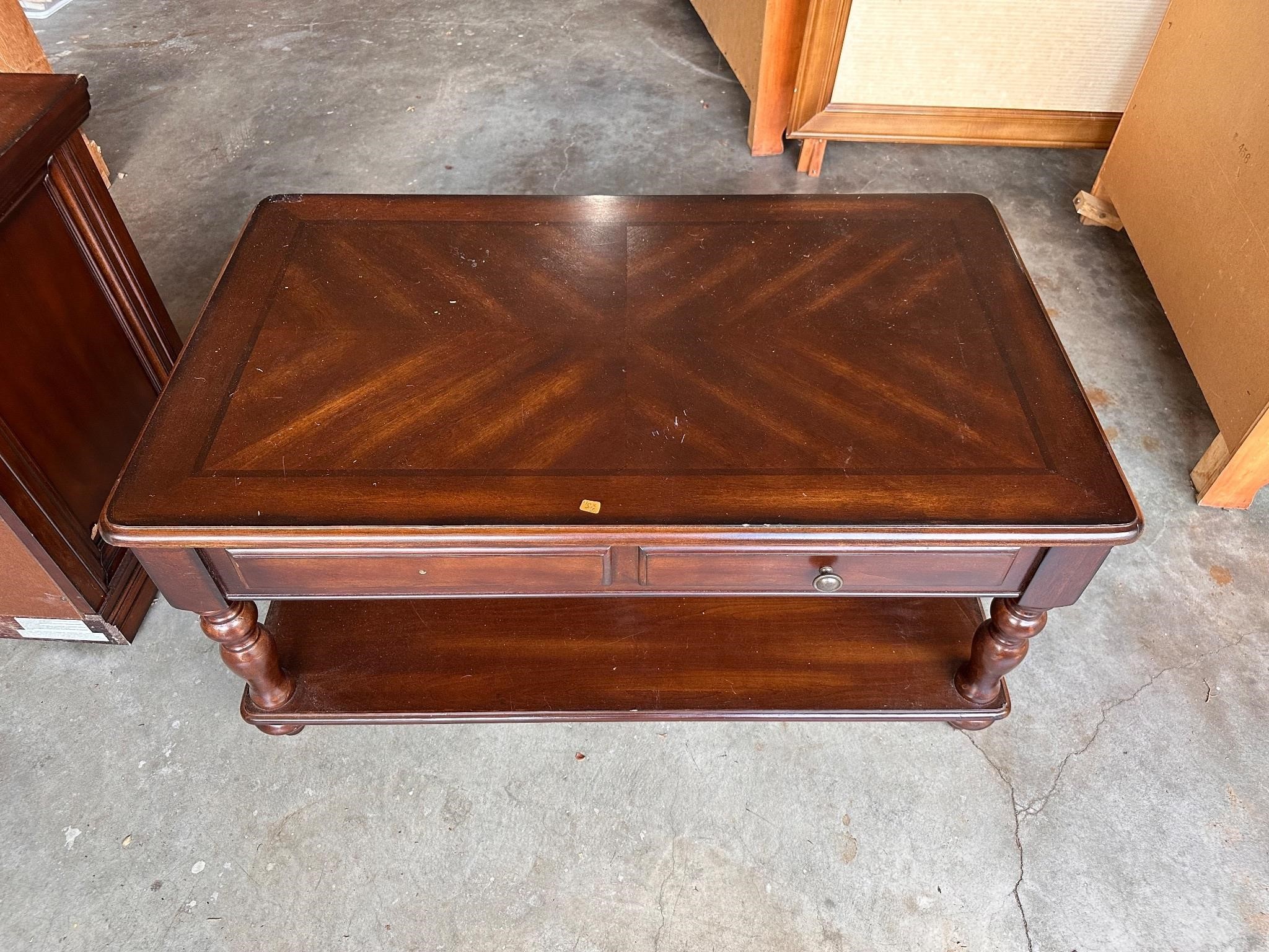 Nice coffee table with raising top