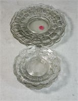 4 saucers and 4 plates in clear glass