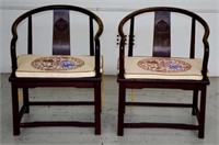 Pair of Chinese hardwood horseshoe armchairs
