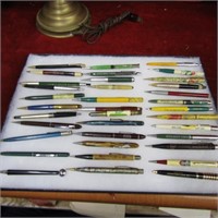 Showcase of vintage advertising pens & pencils.