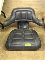 Tractor seat adjustable