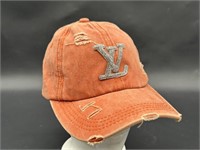 Louis Vuitton Women’s Orange Cap with Bling Logo