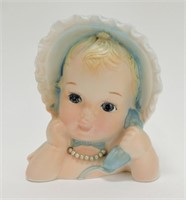 Enesco E-2185 baby with bonnet on telephone