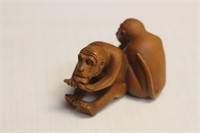 A Signed Japanese Wooden Netsuke