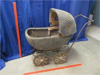 antique wicker baby buggy - over 100 years old