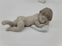 Lladró sleeping boy figurine 6497