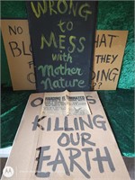 Protest signs/newspaper