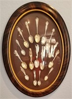 819 - SILVER SPOON COLLECTION IN OVAL FRAME