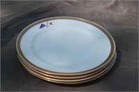 Four dinner plates each with New York Yacht Club