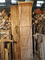 2 wooden toboggans 63x14