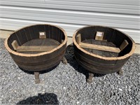 2 Wooden oak barrel planters that swivel.25" dia.