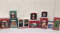 Group of Hallmark keepsake ornament in boxes