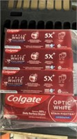 Four tubes of Colgate toothpaste