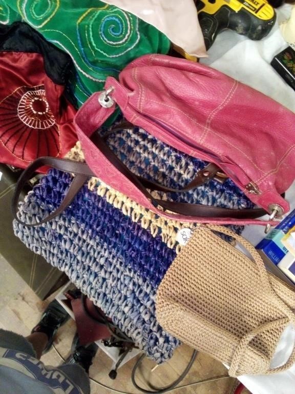 Large lot of purses and travel bag with wheels
