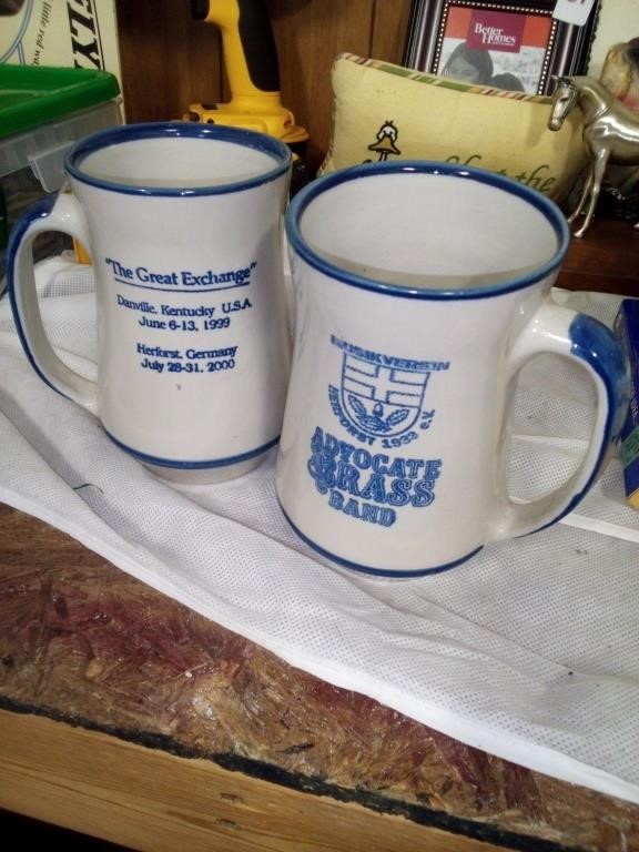 2 Louisville stoneware advocate brass band  mugs