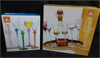 Two complete sets of wine glasses