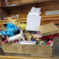 Box of ribbon, bows and boxes