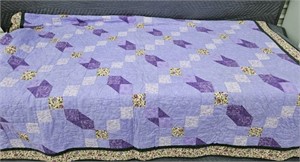 Twin size Quilt, hand quilted  by