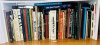 Shelf of large decorative type books