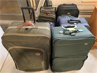 LARGE GROUP OF SUITCASES OF ALL KINDS