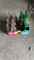 (9) glass coke & (5) 7 up bottles