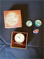 Vintage campaign buttons and clock