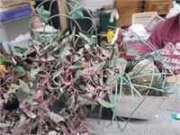 2 metal hanger planters fake plants
