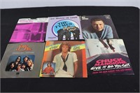 45 RPM Records Featuring: Henry Mancini; Steve Law