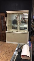 Glass display case with cabinet base