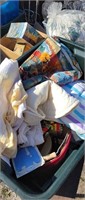 Tote of table cloths fabric and sewing items