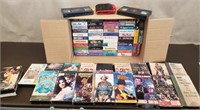Box of VHS Tapes. Painting, Tai Chi, Rom Com &
