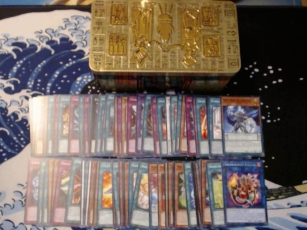 50+ Assorted Yu-Gi-Oh Cards With Tin