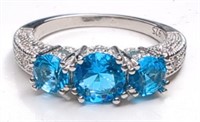 Sterling Blue Topaz 3-Stone Ring. Ring is size 9