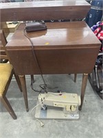 Sewing machine stand w/ 2 singer sewing machines