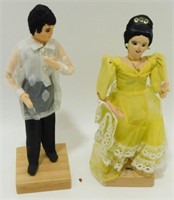 3 Souvenir Dolls - 2 on Wooden Stands