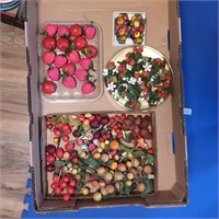 Box of plastic fruit