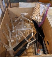 Box of acrylic platter stands and acrylic display