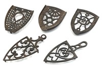 (5) Antique Cast Iron Sad Iron Trivets Including