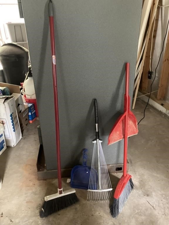 2 brooms with dustpans and rake