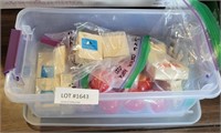 SMALL PLASTIC TOTE OF NOS FISHING SUPPLIES