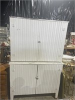 Antique wainscoting step back cabinet