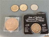 2 Indiana bronze tokens + 2 Evansville tokens