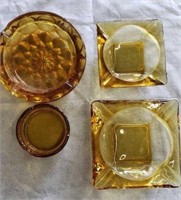 4 Vintage Amber Glass Ashtrays $80