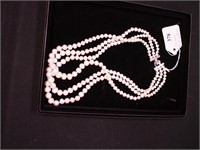 Cultured three-strand pearl choker, clasp