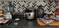 Cuisinart blender, vases, wooden tray, other