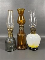 Four Vintage Miniature Oil Lamps
